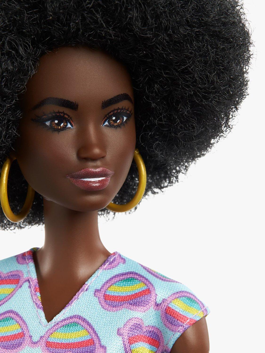 Barbie doll with afro hair and wheelchair, UK version