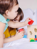 Melissa & Doug wooden shape sorting cube with 12 chunky shapes, imported from the UK