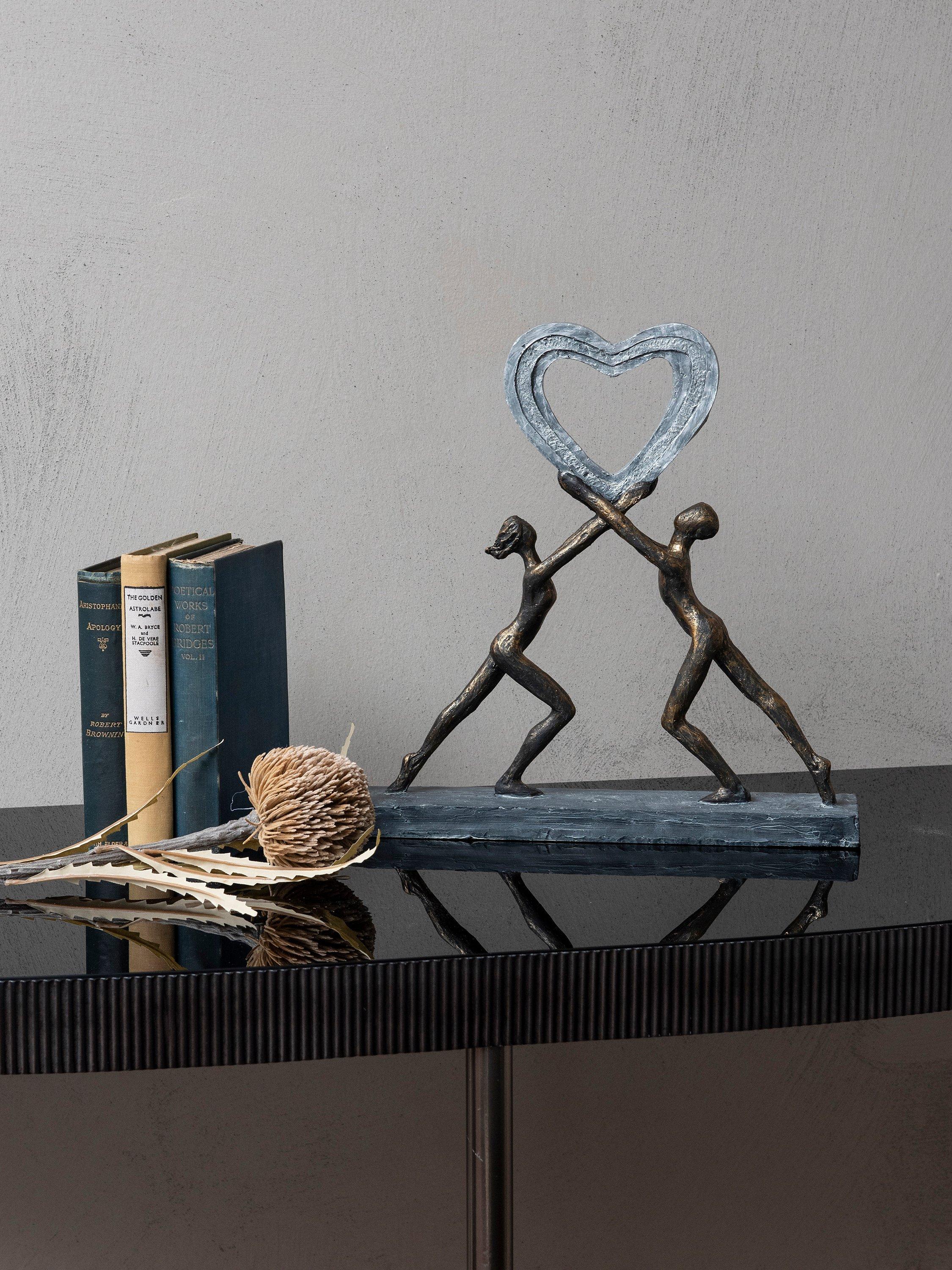 Libra Interiors love couple resin sculpture metallic bronze, imported from the UK