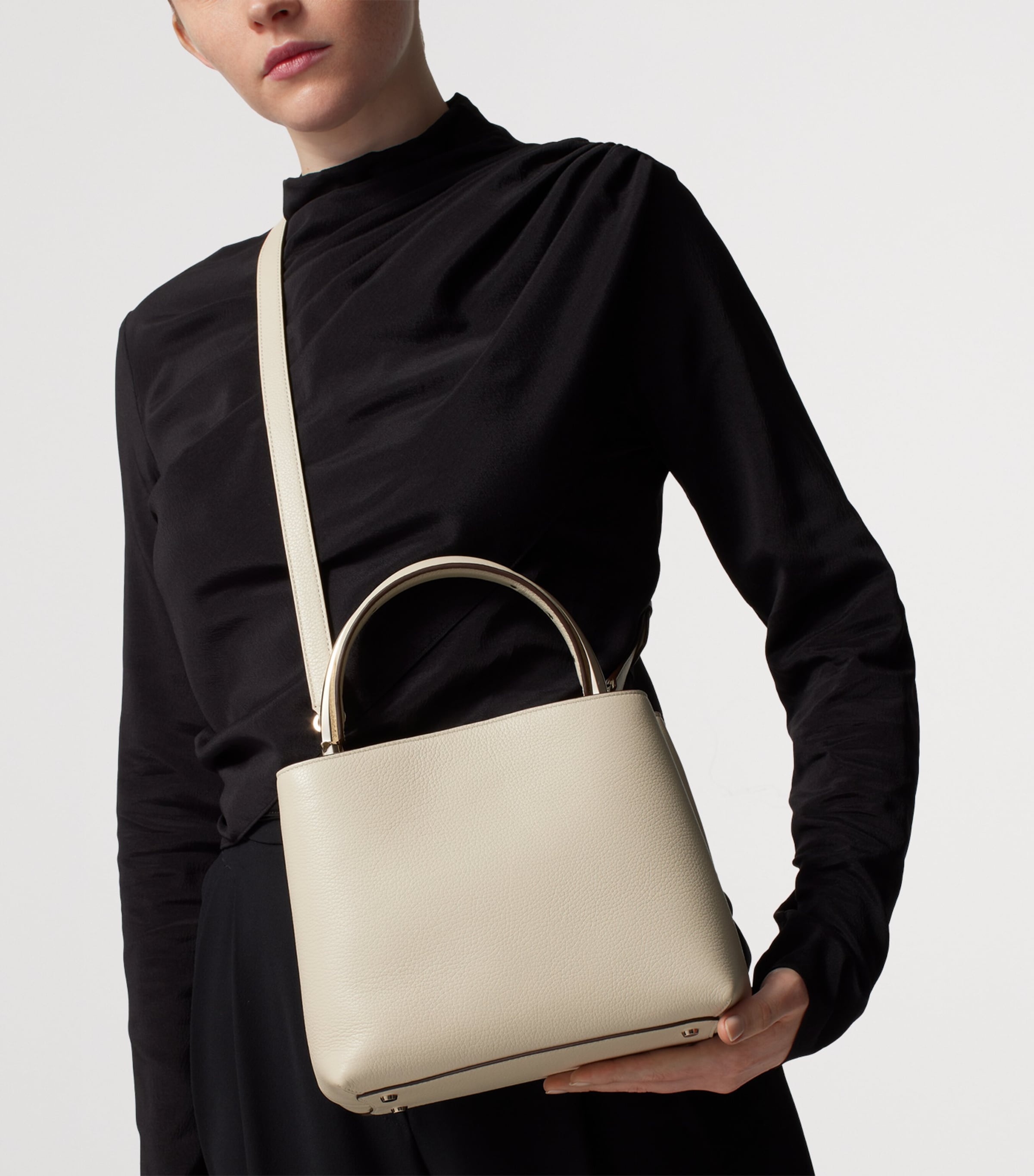 Cartier small leather top-handle bag with panther motif, UK version