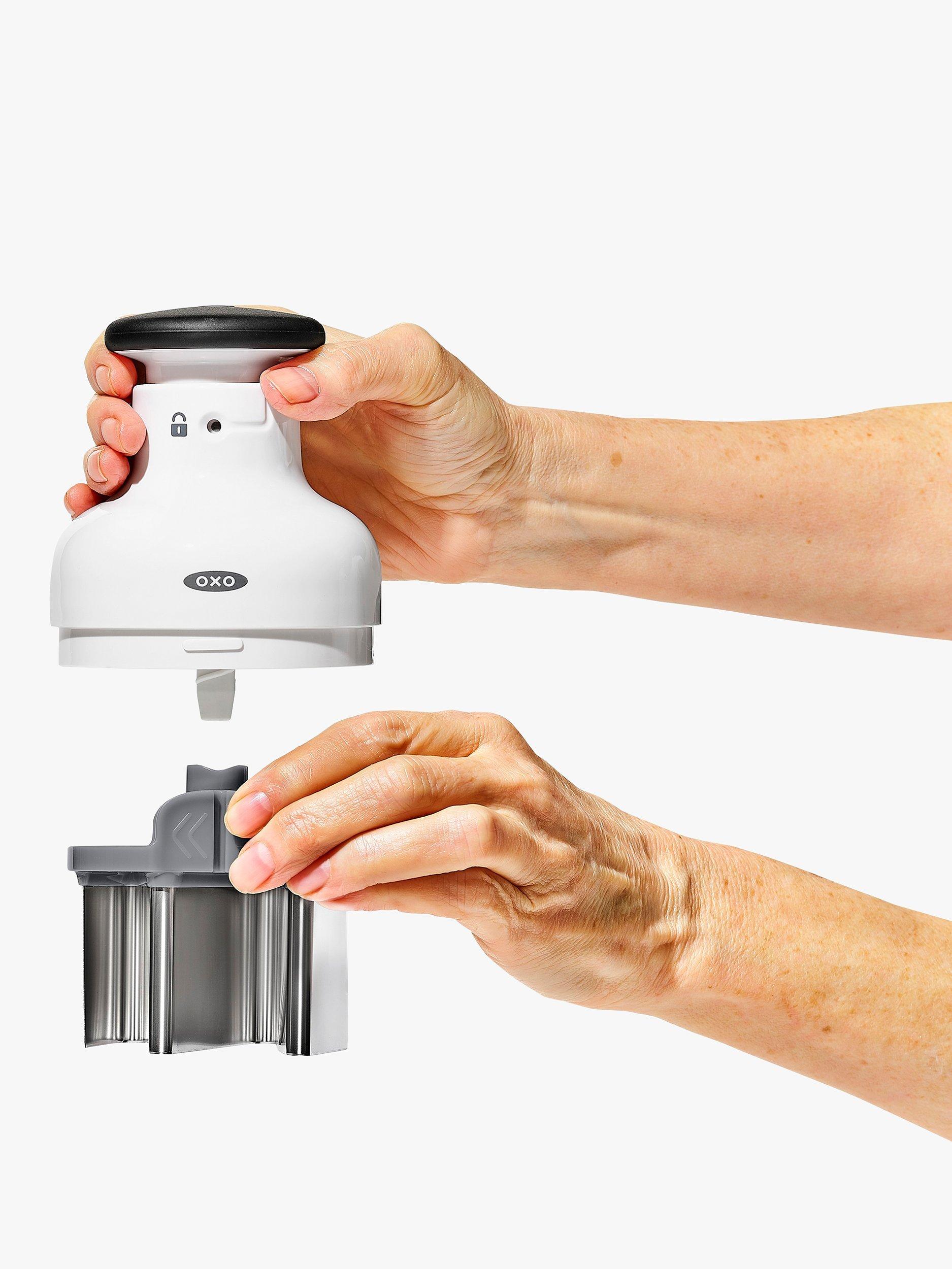 OXO kitchen chopper with stainless steel blade and measuring cup, imported from the UK