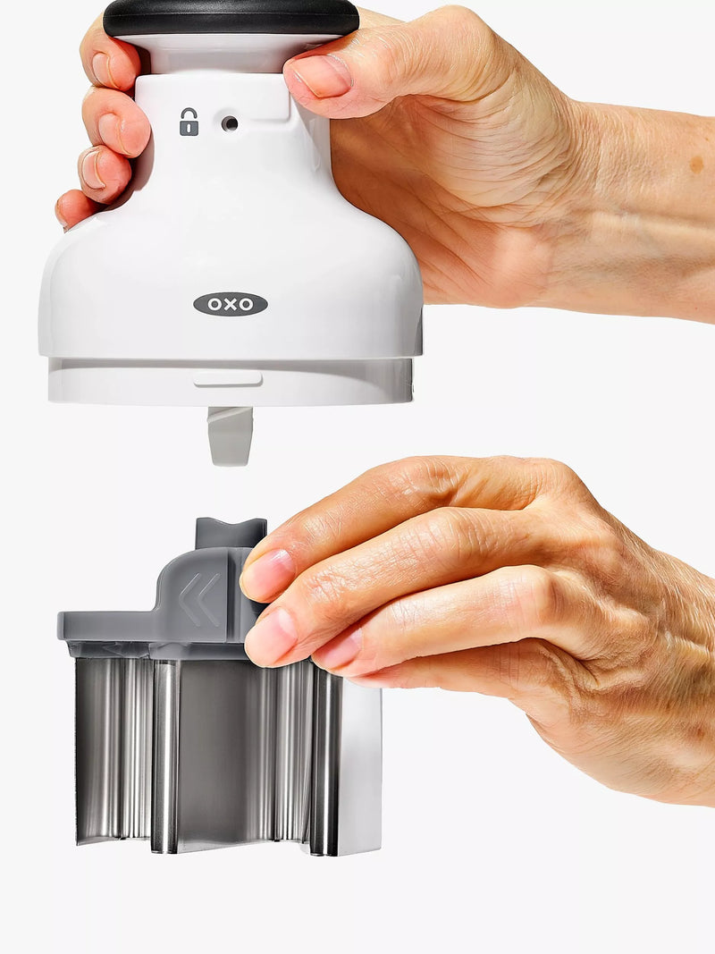 OXO kitchen chopper with stainless steel blade and measuring cup, imported from the UK