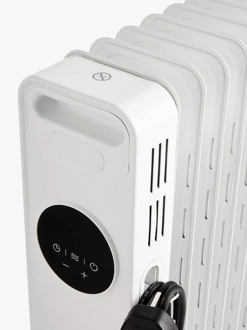 John Lewis 2500W digital oil radiator, imported from the UK