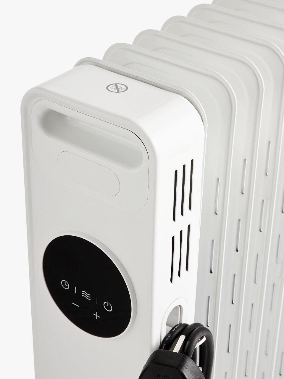 John Lewis 2500W digital oil radiator, imported from the UK