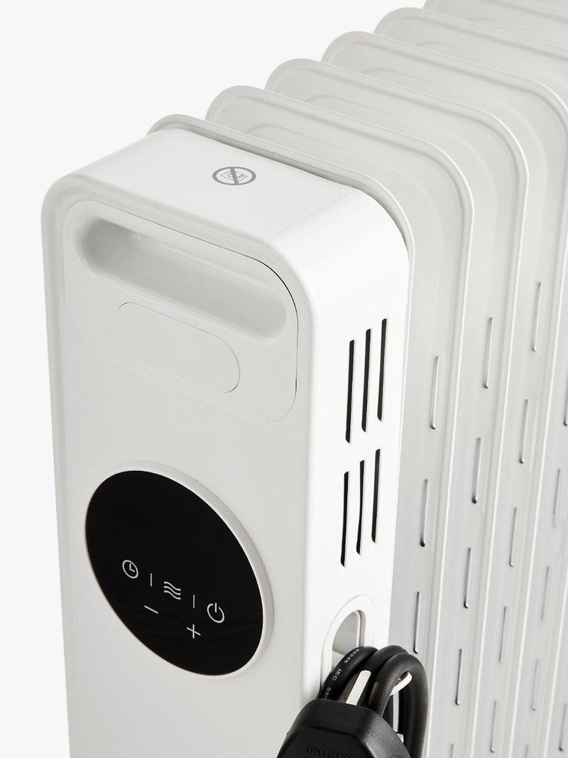 John Lewis 2500W digital oil radiator, imported from the UK