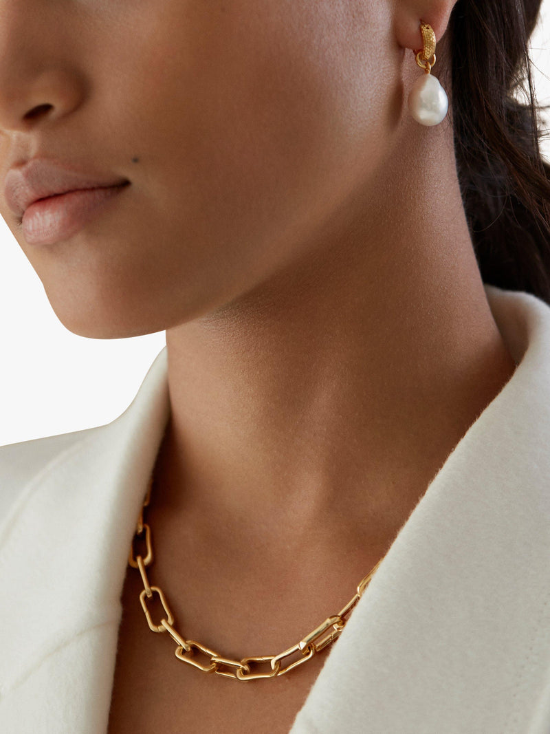 Monica Vinader baroque pearl huggie earrings in gold, imported from the UK
