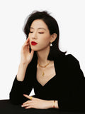 Monica Vinader baroque pearl huggie earrings in gold, imported from the UK