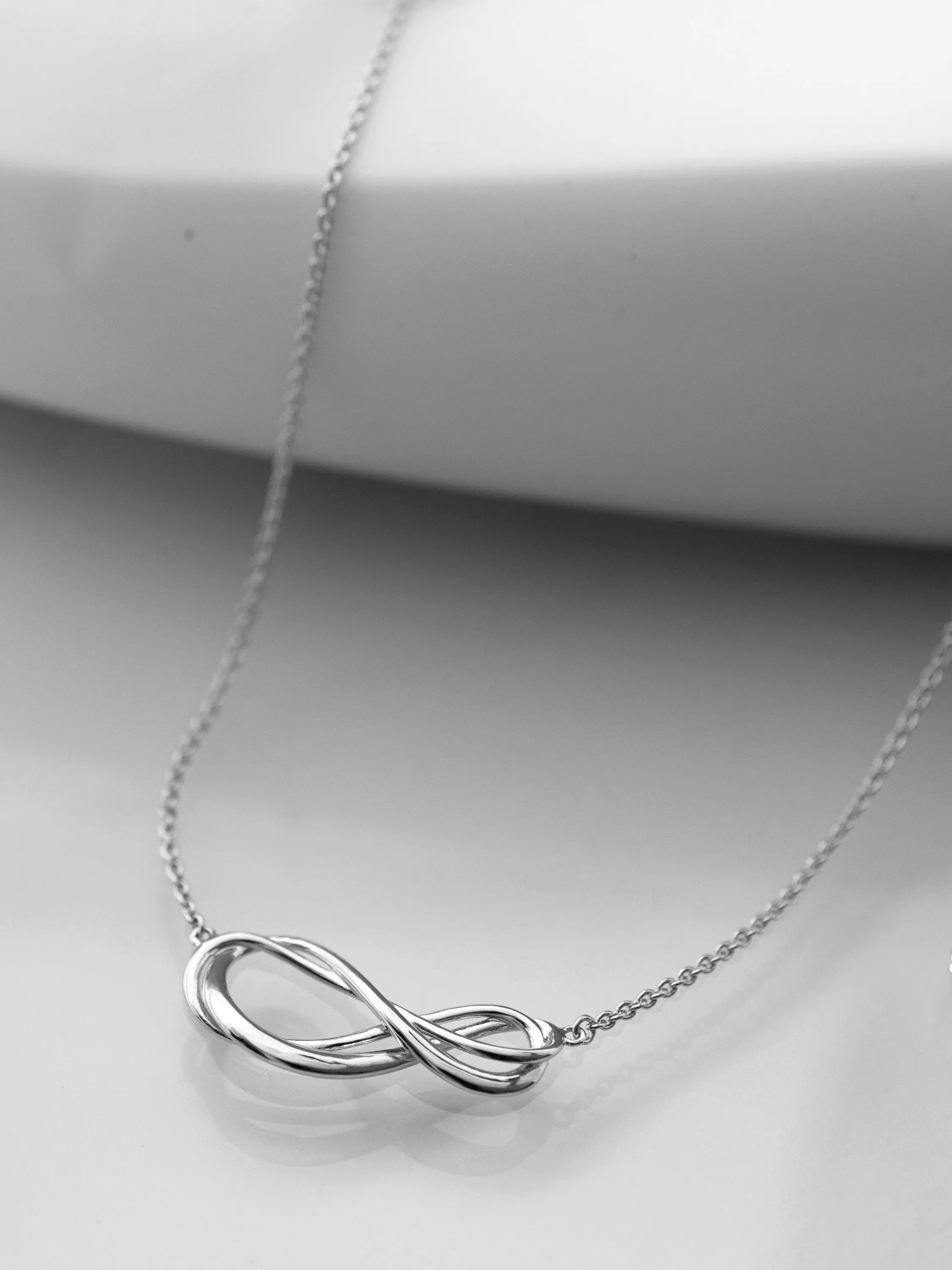 Kit Heath Infinity Pendant Necklace in silver (British brand)