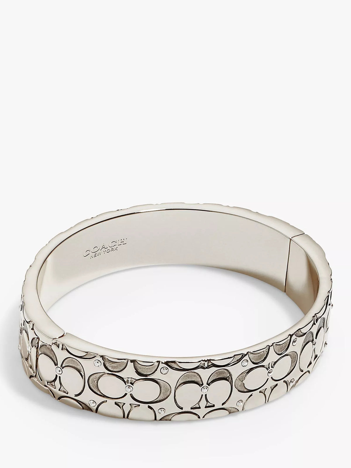 Coach silver crystal bangle with hinged closure, imported from the UK