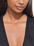 Edge of Ember 14ct gold initial pendant imported from the UK