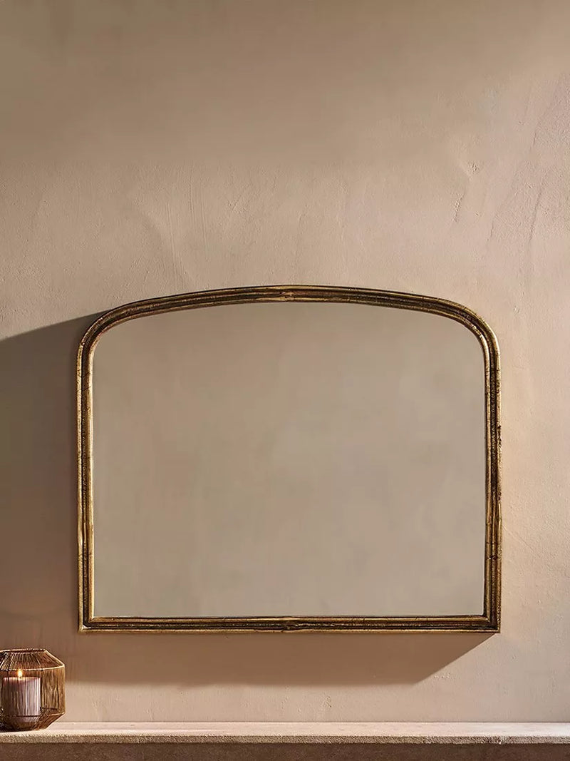 Nkuku Almora arched overmantel mirror antique brass finish - British product
