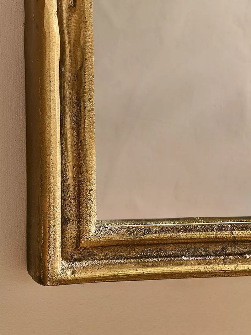 Nkuku Almora arched overmantel mirror antique brass finish - British product