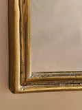 Nkuku Almora arched overmantel mirror antique brass finish - British product
