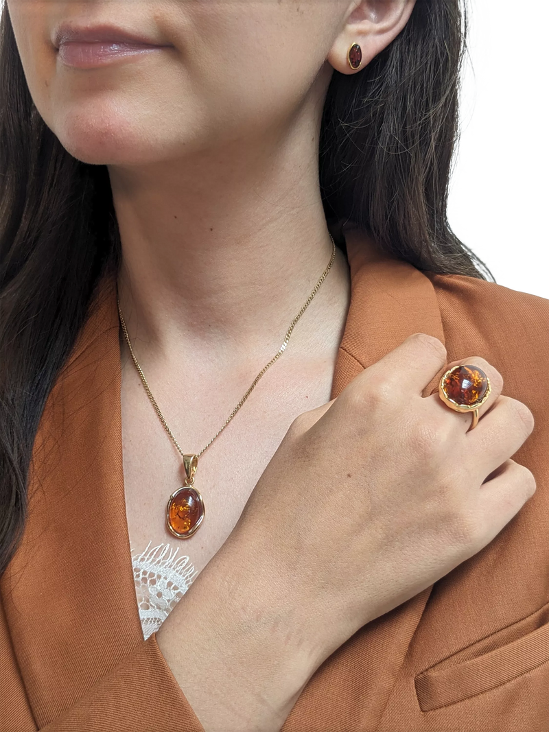 Be-Jewelled Baltic amber oval cabochon ring in Gold/Cognac, imported from the UK