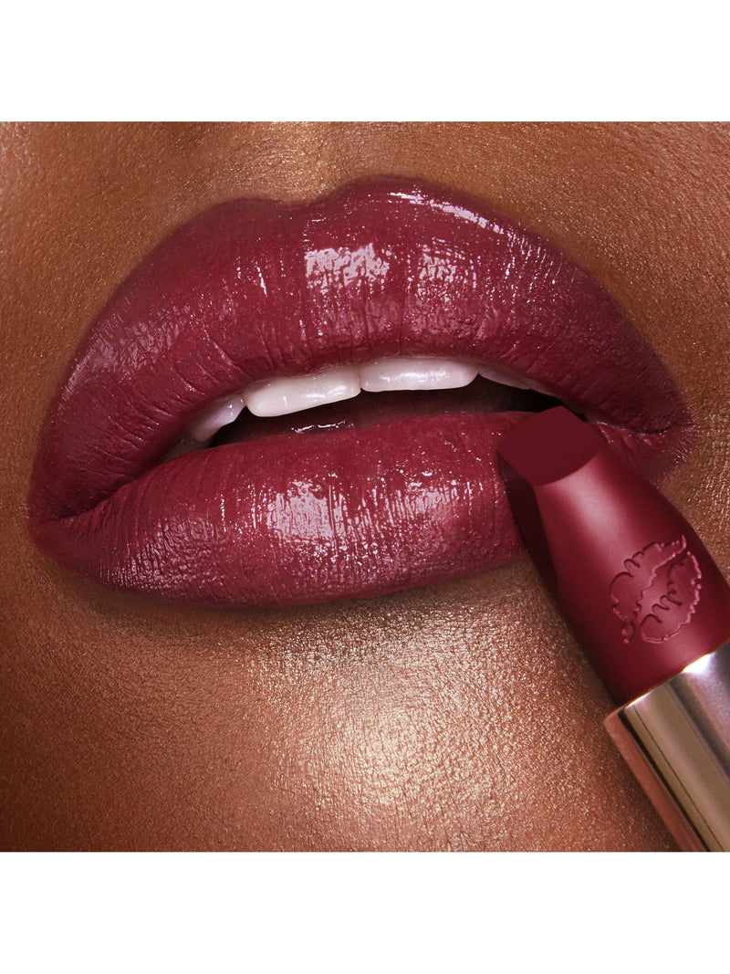 Charlotte Tilbury deep berry-red lipstick in Ready For Lust shade - British product