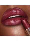 Charlotte Tilbury deep berry-red lipstick in Ready For Lust shade - British product