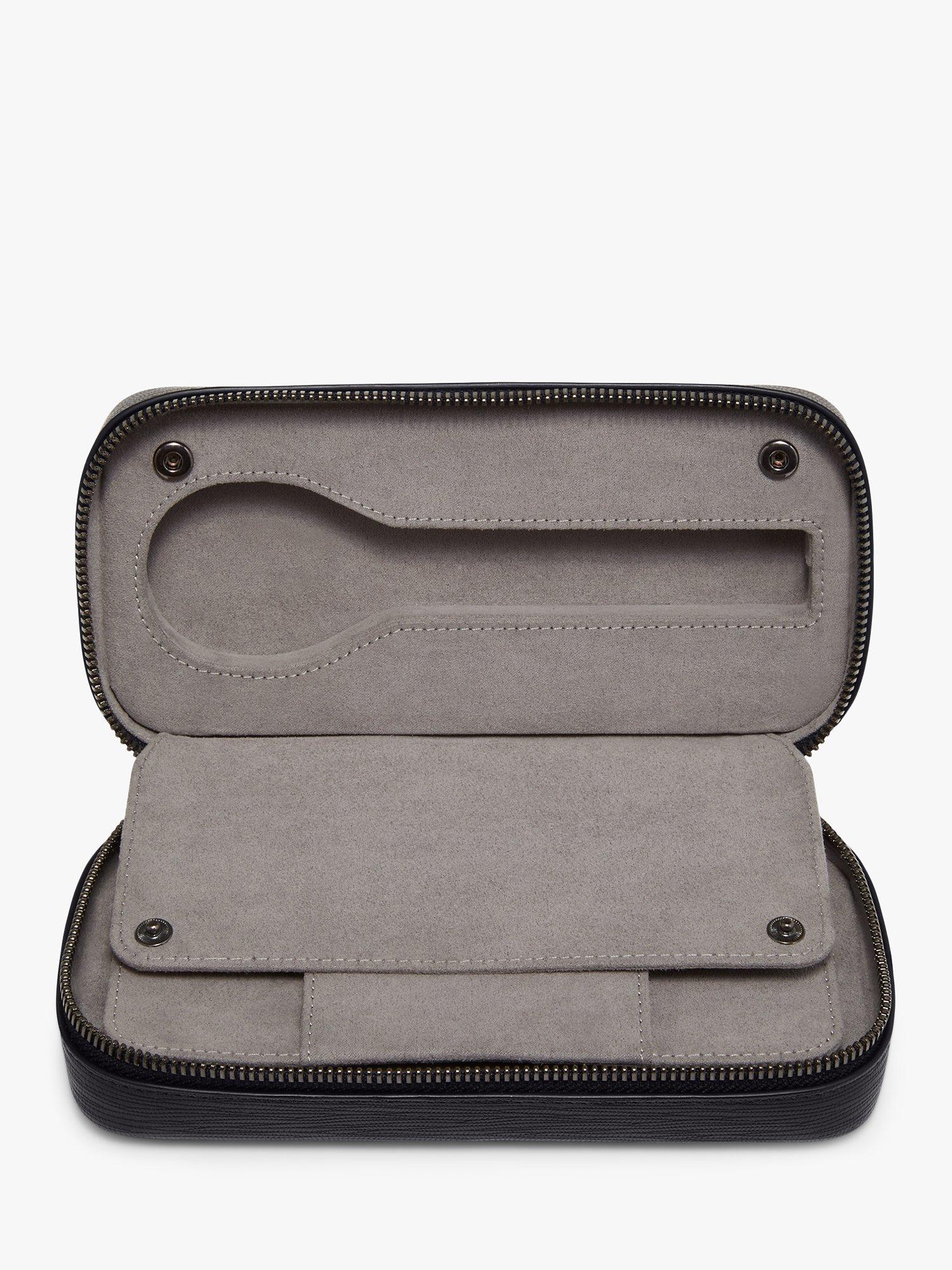 TUMI Leder Reise Uhrenetui schwarz geprägt, UK Version