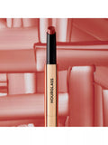 Hourglass volumising glossy lip balm in red, UK version