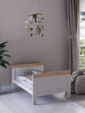 Little Acorns convertible cotbed in white and oak finish, UK version