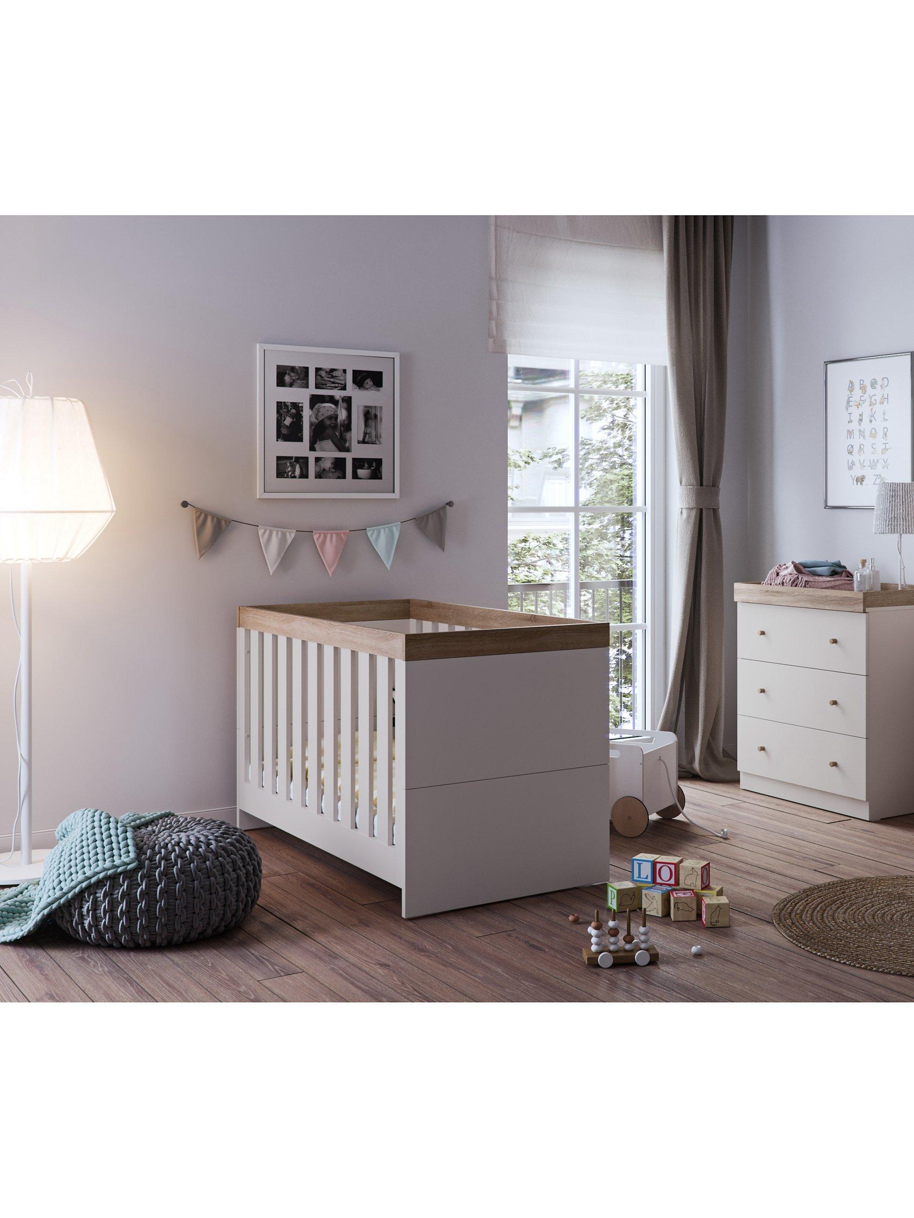 Little Acorns Burlington Cotbed featuring oak accents and MDF finish, UK version