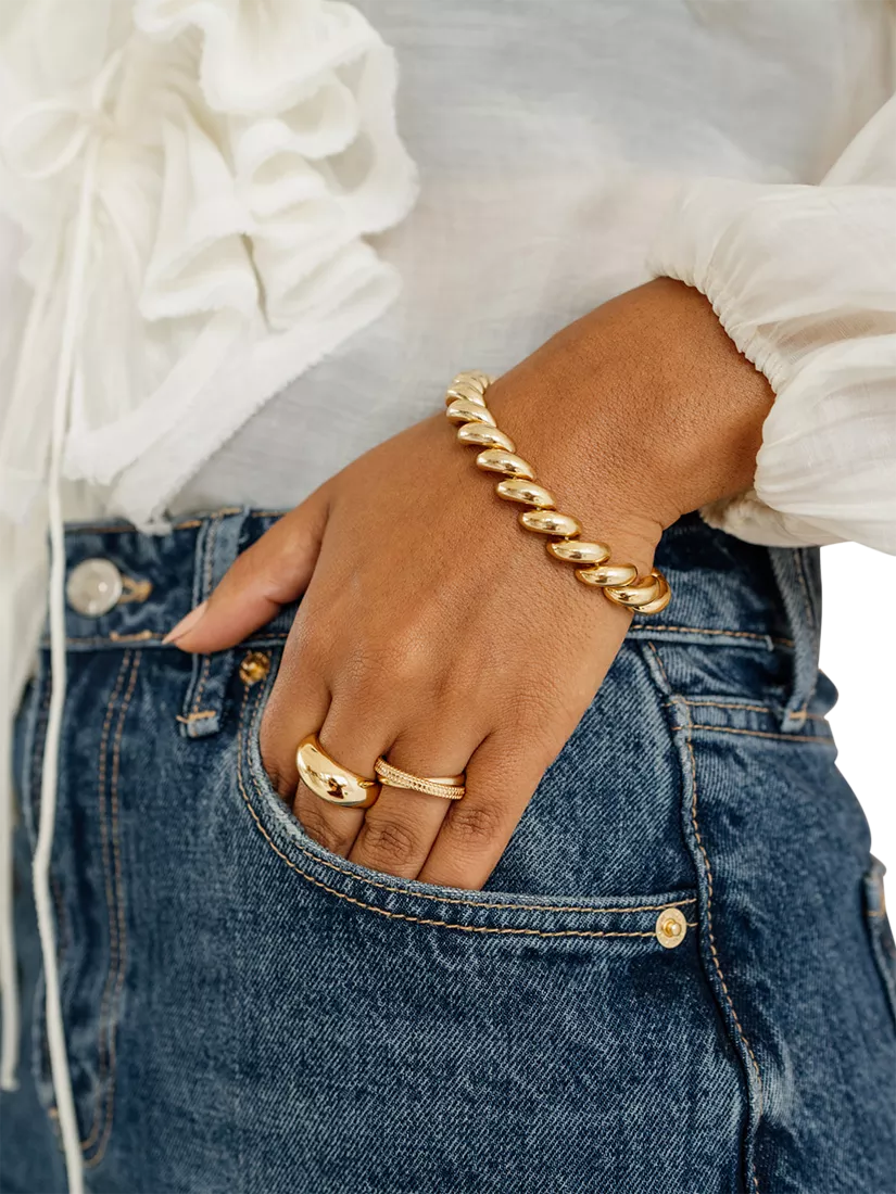 LARNAUTI San Marco gold curved spiral bracelet imported from the UK