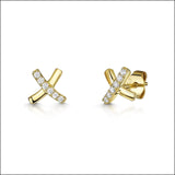 Jools cross stud earrings in silver (British brand)