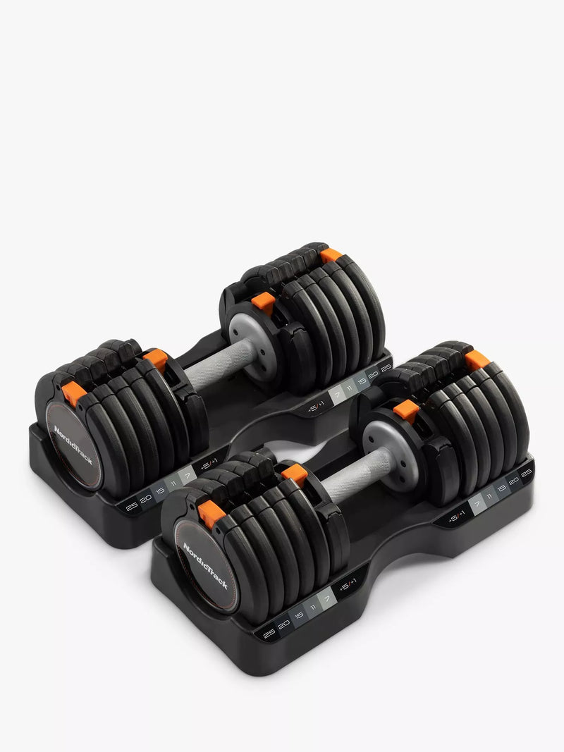 NordicTrack adjustable dumbbell set with 5kg to 25kg weight range, imported from the UK