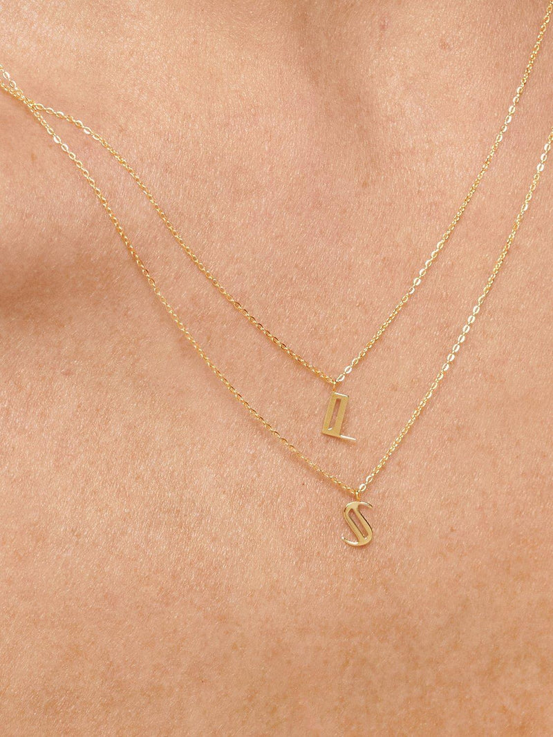Monica Vinader yellow gold small initial pendant necklace, British brand