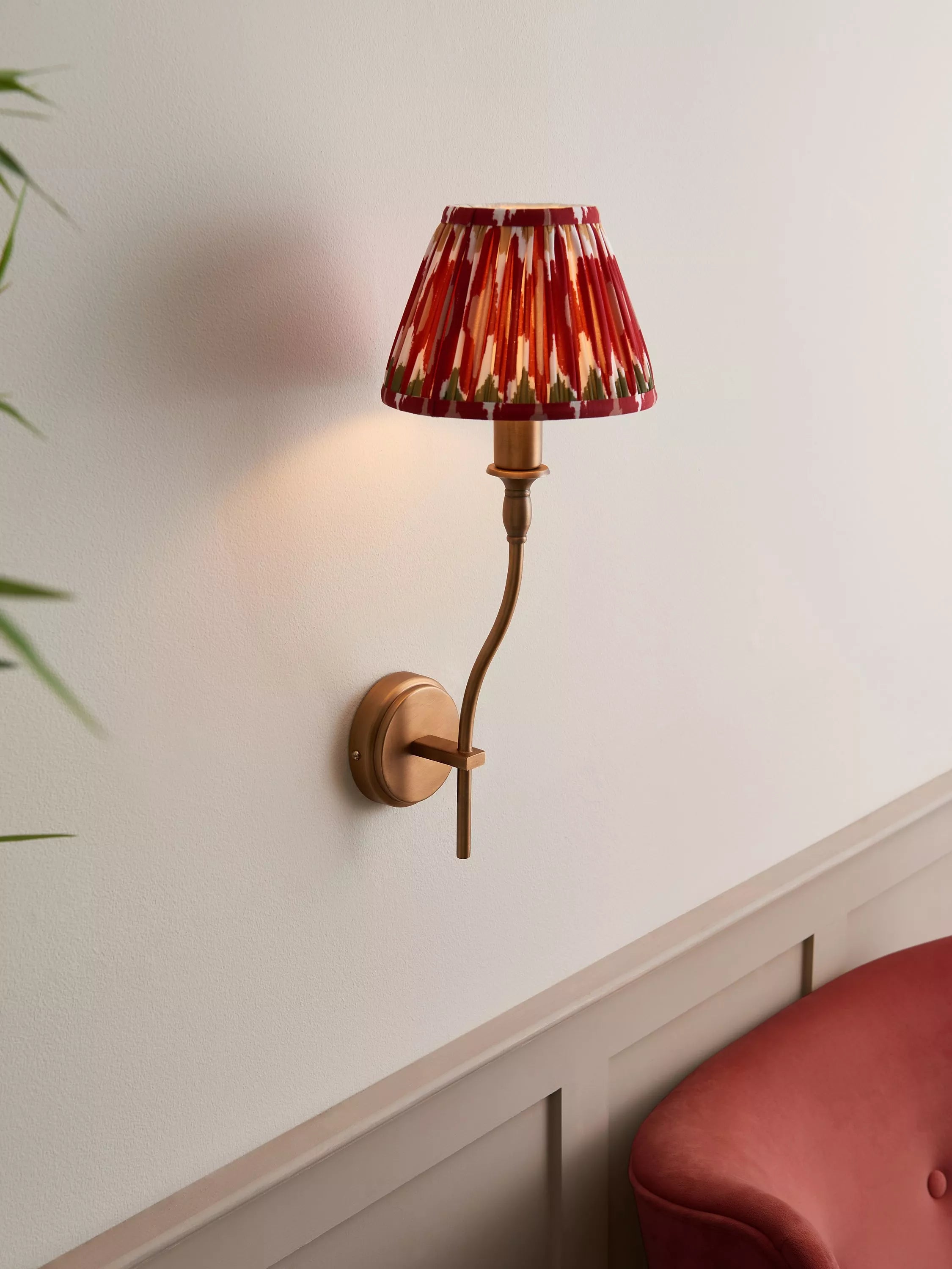 John Lewis Elk wall light fitting in matt antique brass, imported from the UK