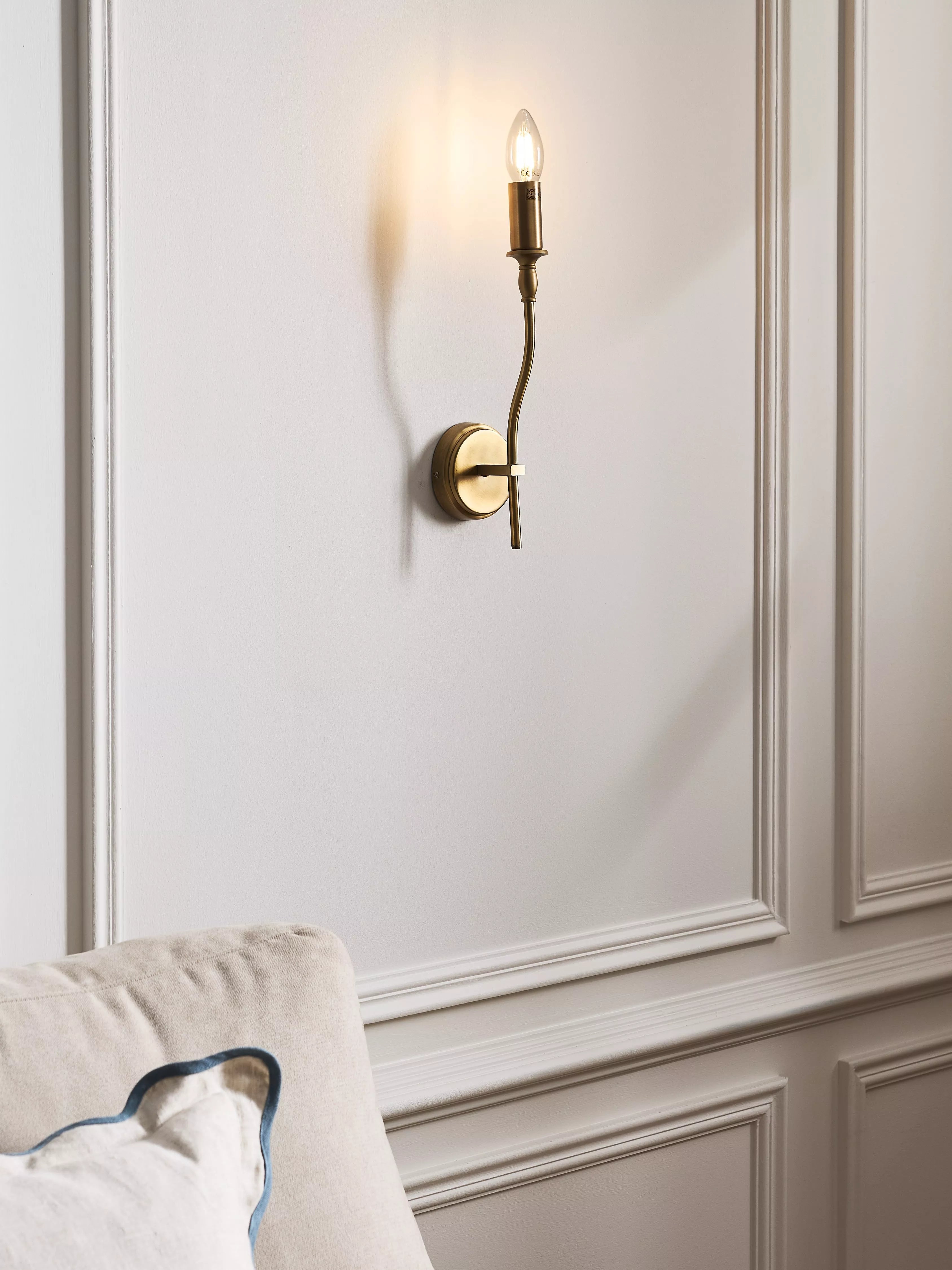 John Lewis Elk wall light fitting in matt antique brass, imported from the UK