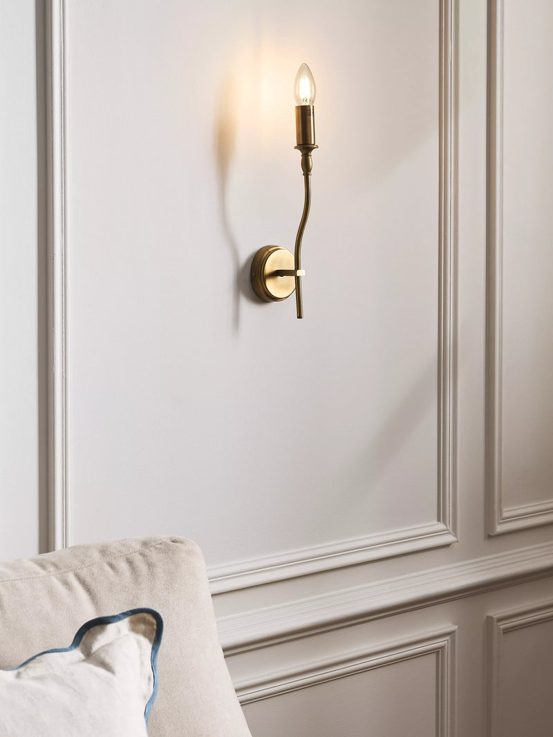 John Lewis Elk wall light fitting in matt antique brass, imported from the UK