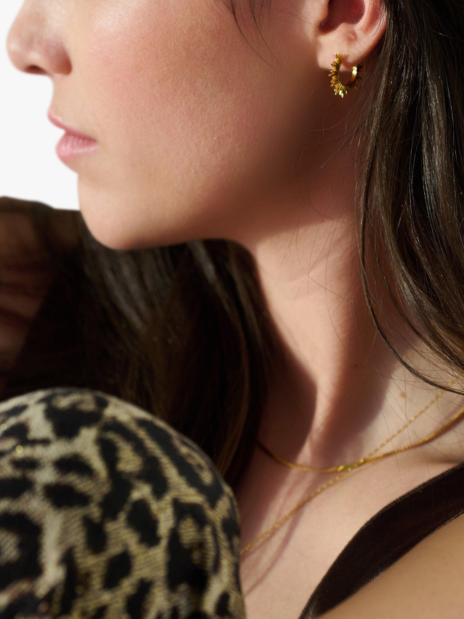Rachel Jackson London mini huggie hoop earrings, imported from the UK