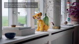 LEGO adult building set with movable lion cub figure, UK version