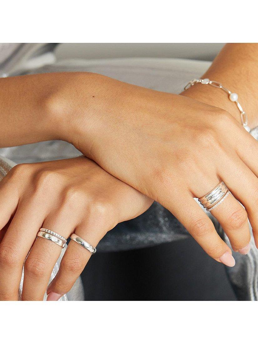 Daisy London topaz half eternity ring in silver, UK version