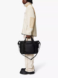 Rains Texel black kit bag 17L, imported from the UK