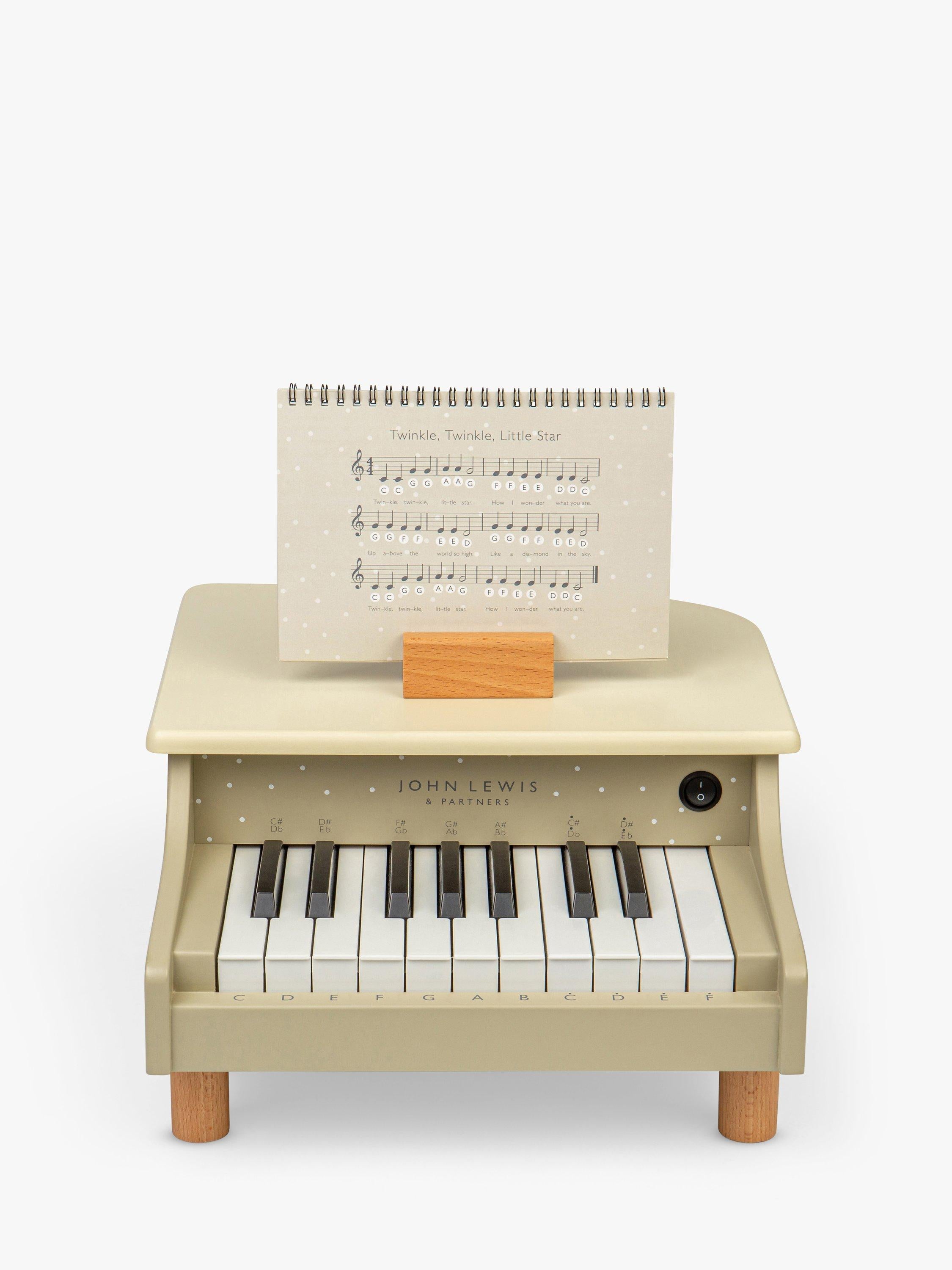 John Lewis toy wooden piano with spotty design (British brand)