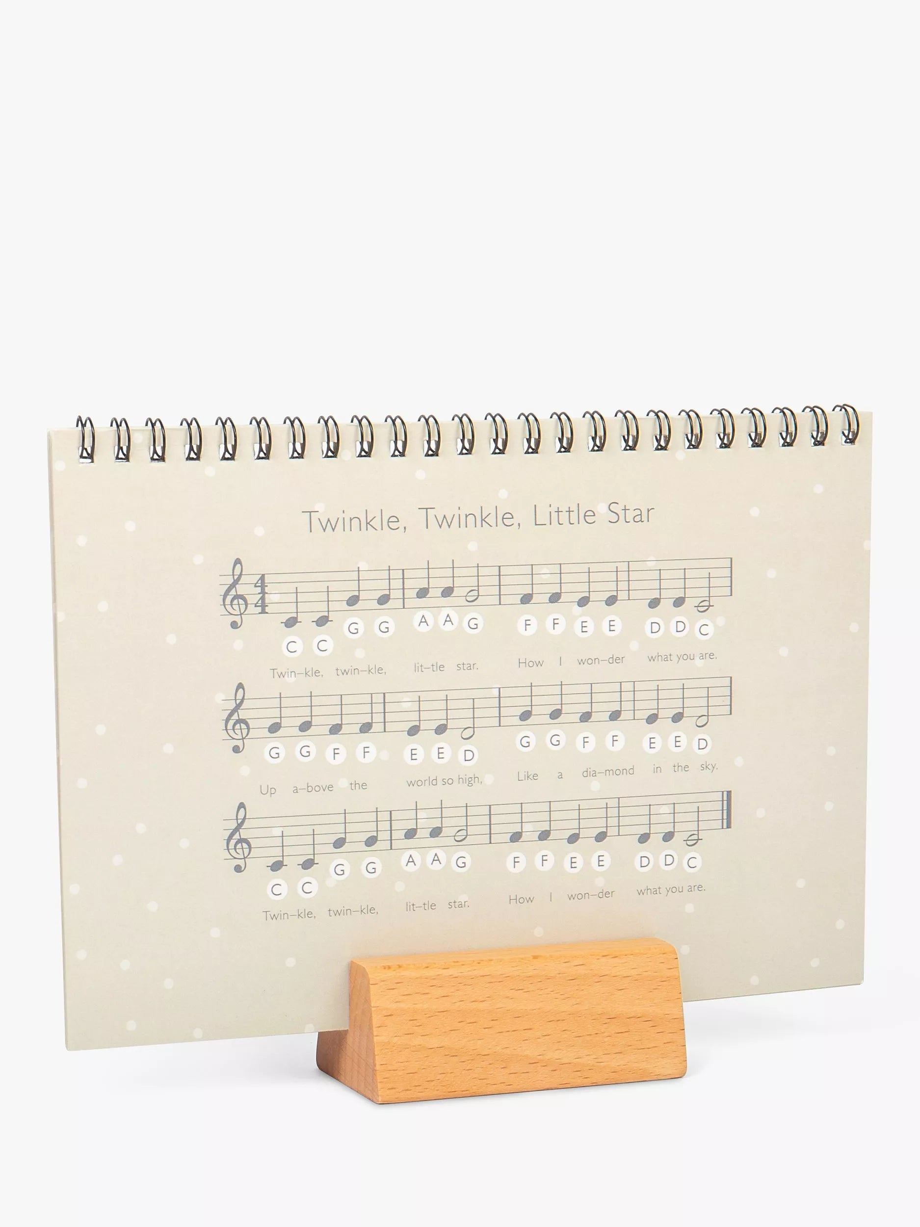 John Lewis toy wooden piano with spotty design (British brand)