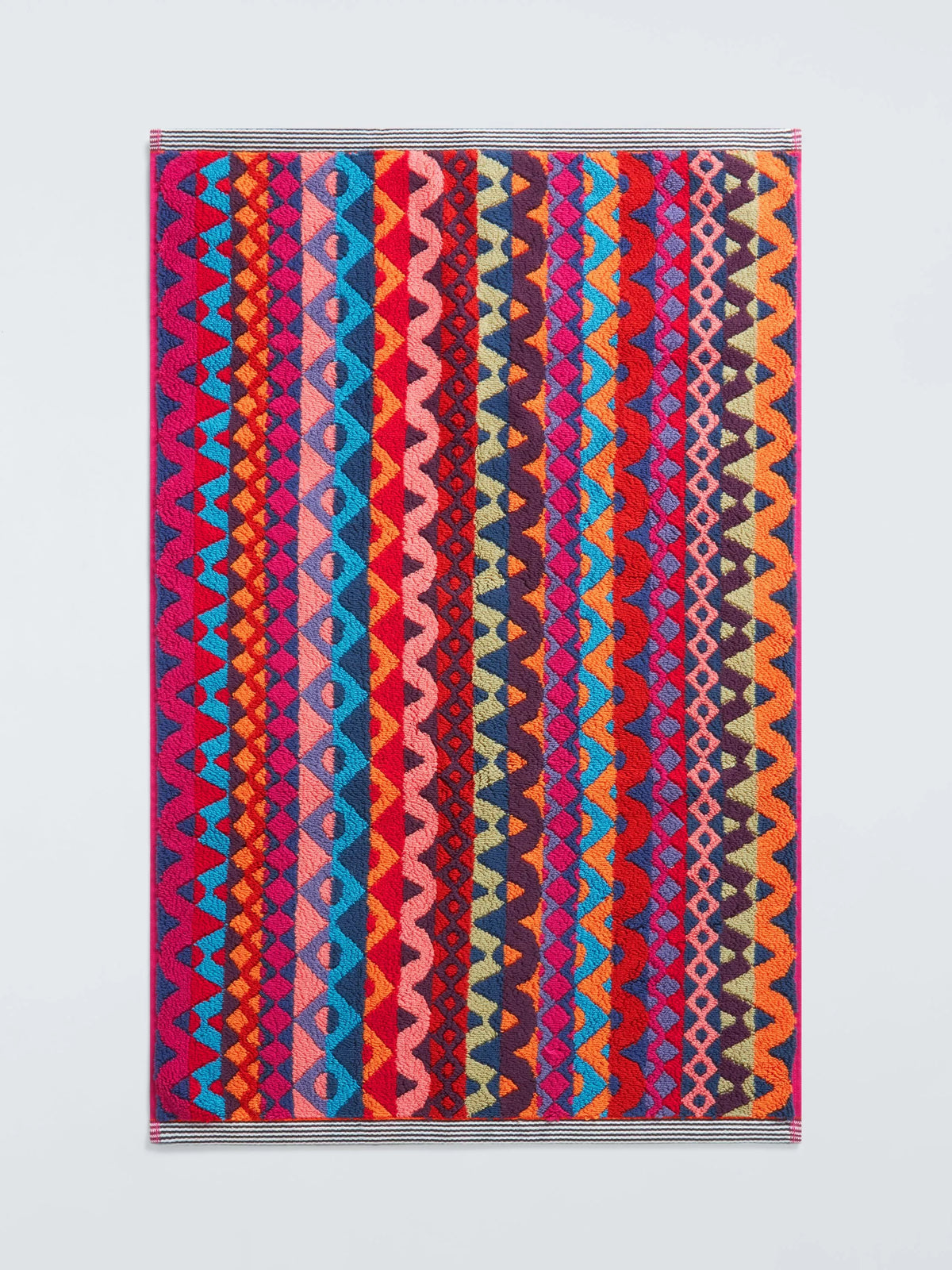 Margo Selby red bath mat, imported from the UK