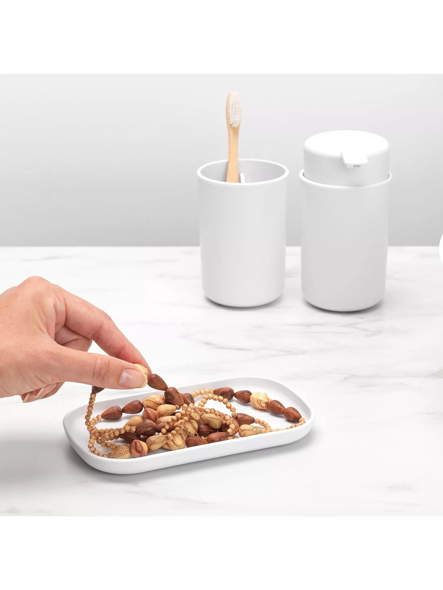 Brabantia ReNew bathroom accessory set, imported from the UK