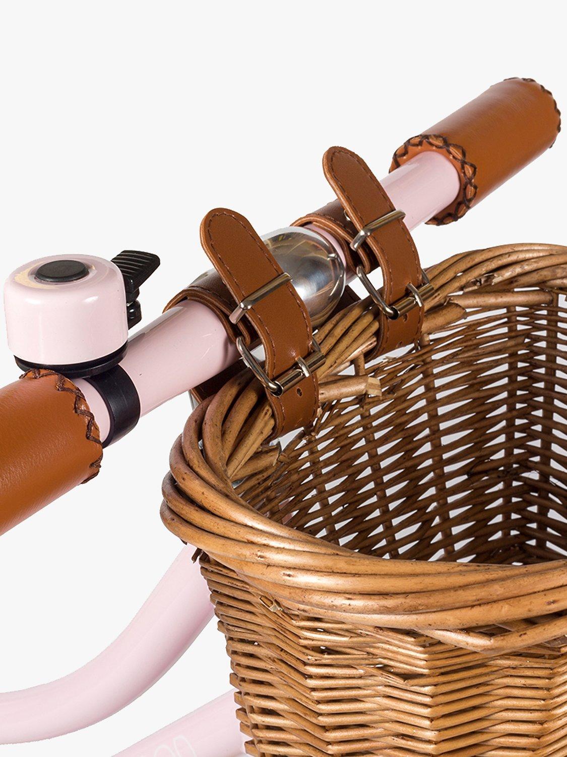 Banwood balance bike with wicker basket and bell, imported from the UK