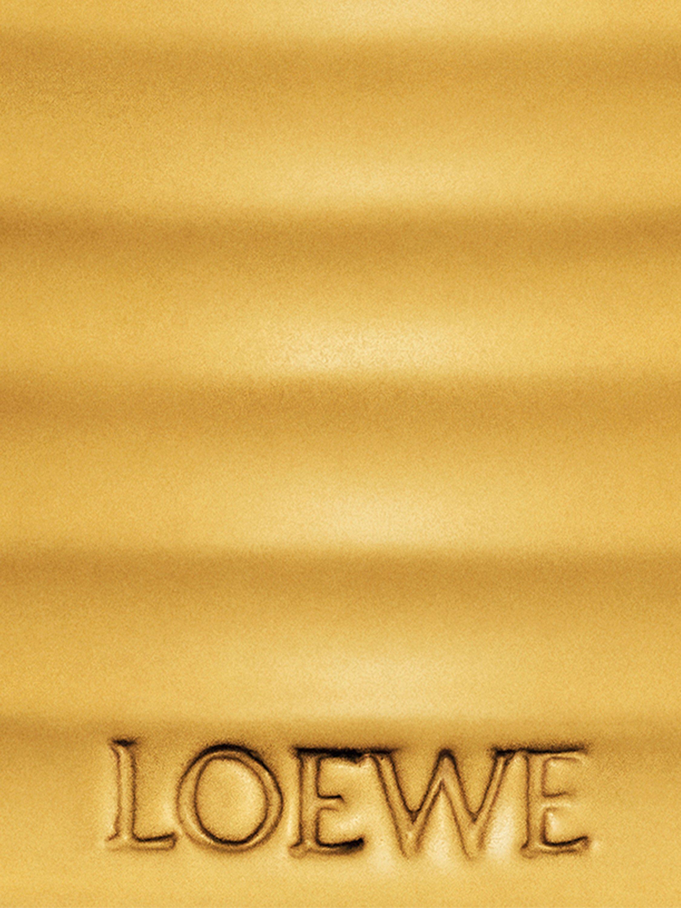 LOEWE wasabi scented candle in yellow-glazed terracotta, UK version