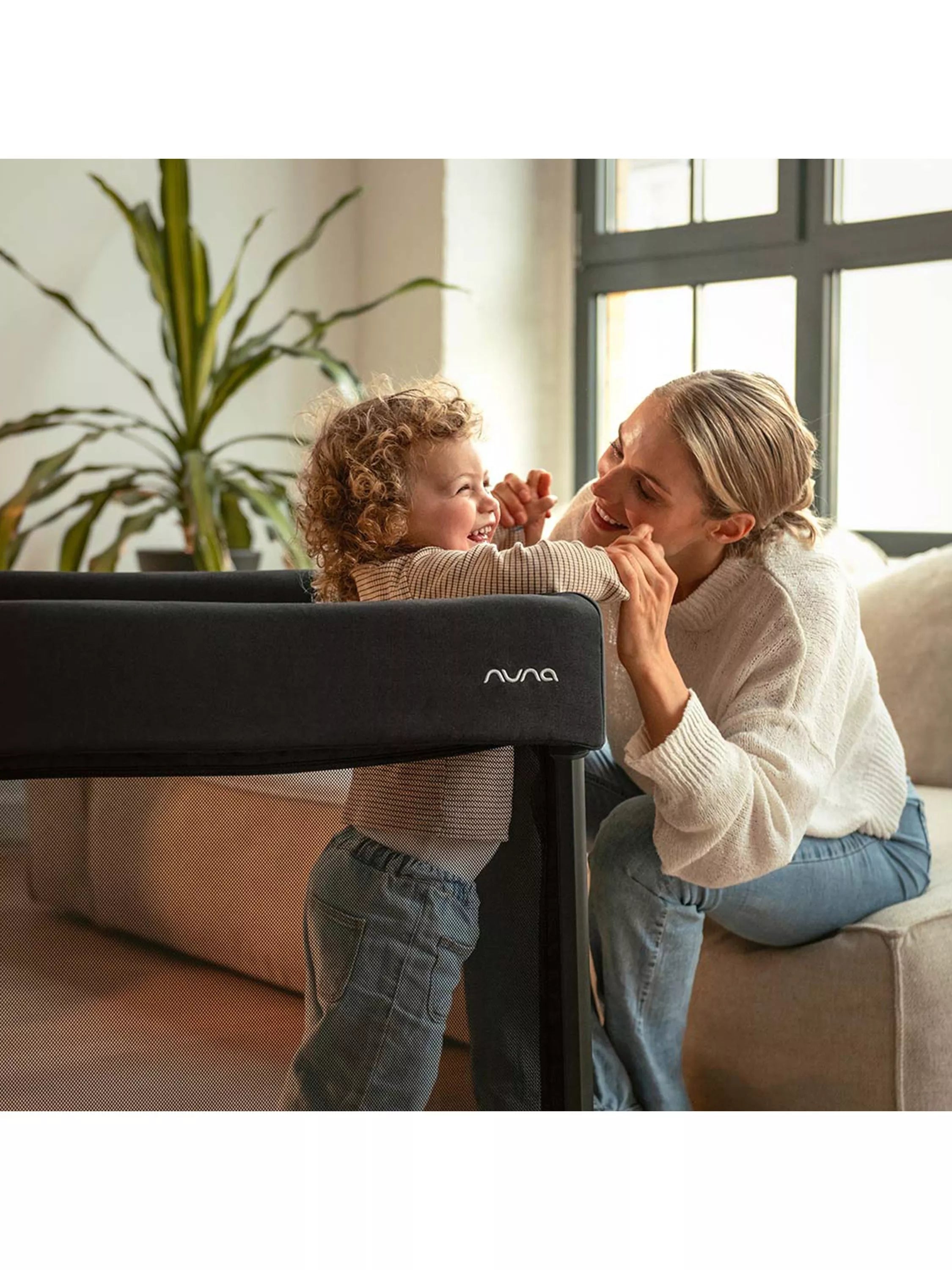 Nuna travel cot in Caviar, imported from the UK