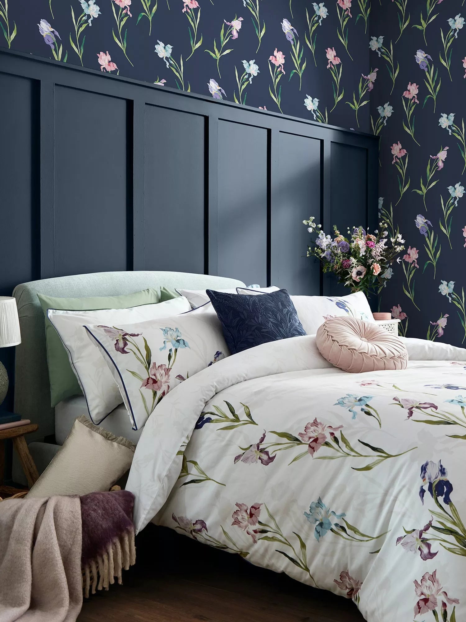 Laura Ashley floral watercolour wallpaper with iris pattern in midnight seaspray, UK version