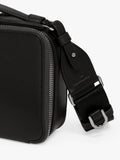 TUMI Myla leather crossbody bag in black gunmetal (British brand)
