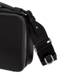 TUMI Myla leather crossbody bag in black gunmetal (British brand)