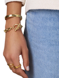 Orelia Organic Molten Bangle in Pale Gold, UK version