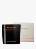 Molton Brown Delicious Rhubarb and Rose luxury candle, imported from the UK