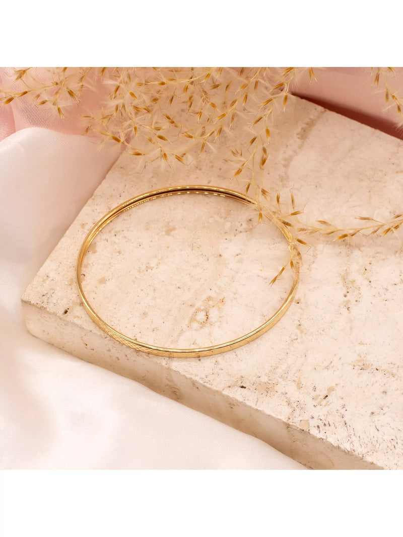 IBB 9ct gold diamond cut flat tube bangle (British brand)