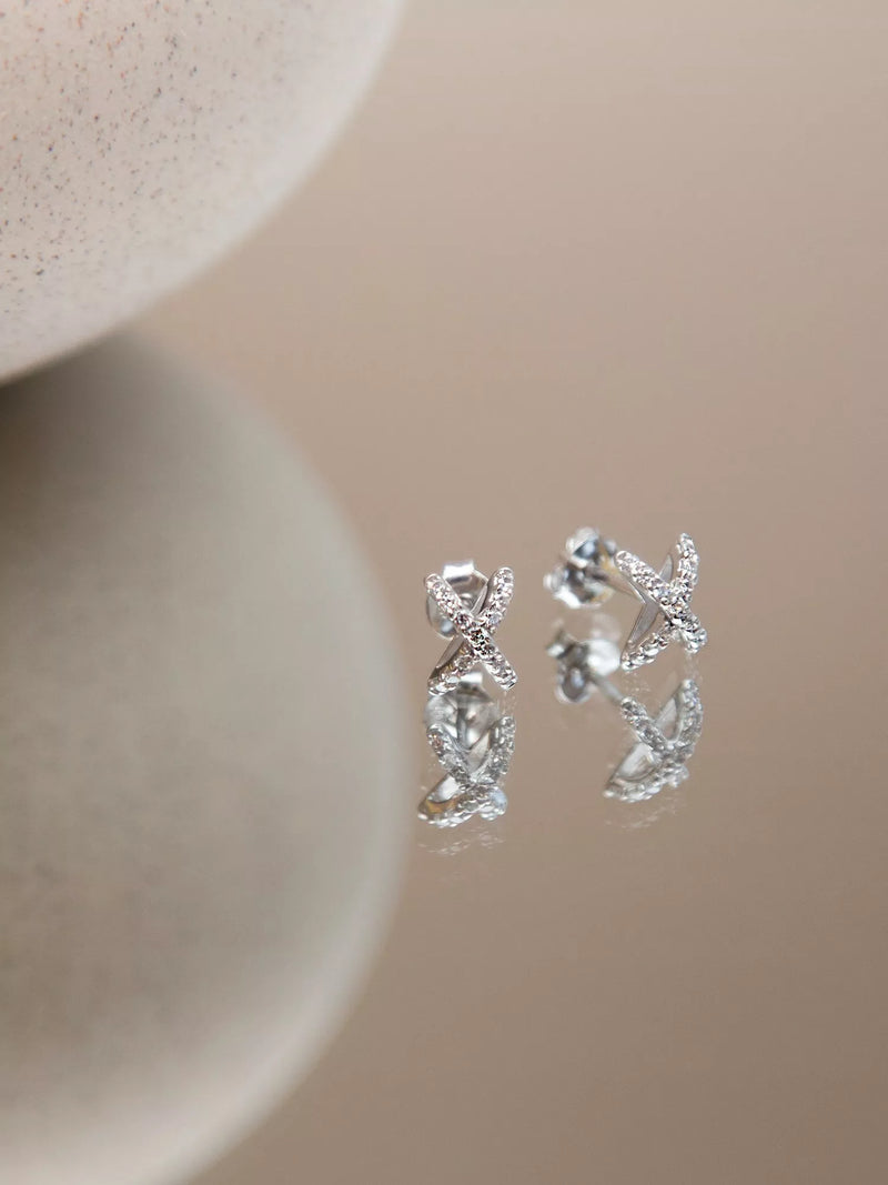 IBB cross cubic zirconia earrings in 18ct white gold - British product