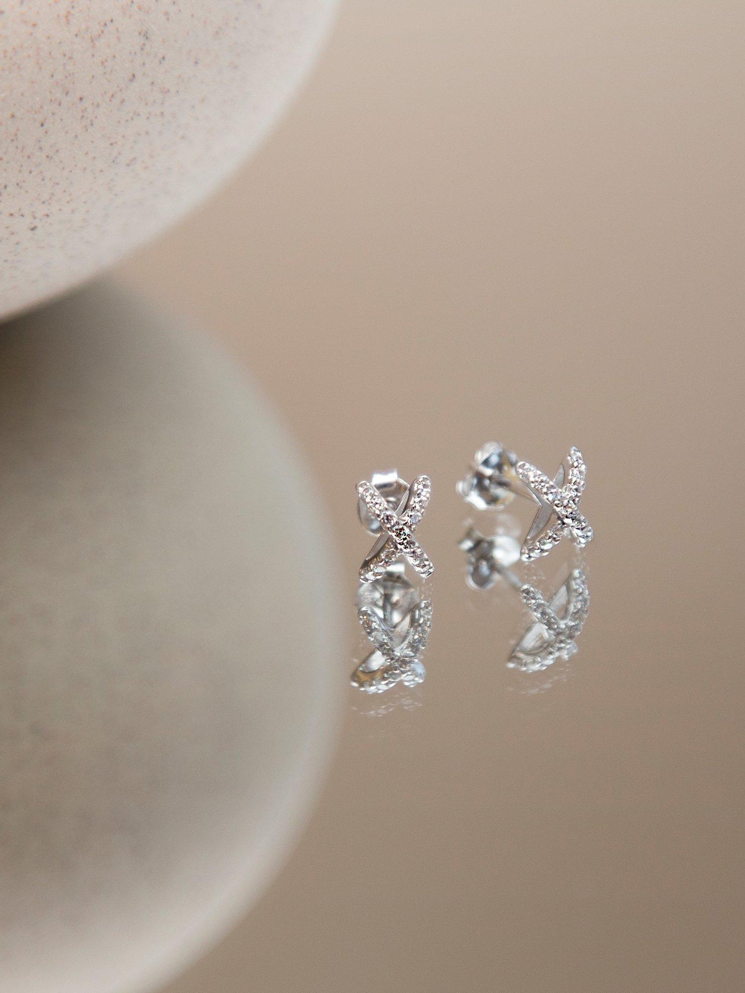 IBB cross cubic zirconia earrings in 18ct white gold - British product